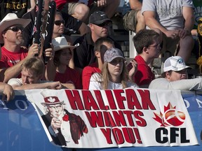 Halifax fans show their support for an East Coast franchise as the Calgary Stampeders and Hamilton Tiger-Cats compete in CFL action in Moncton, N.B. on Sunday, Sept. 25, 2011.