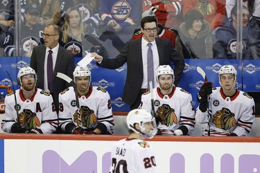 Chicago Blackhawks' head coach Jeremy Colliton disputes a call during third period NHL action against the Winnipeg Jets in Winnipeg on Thursday, November 29, 2018. THE CANADIAN PRESS/John Woods