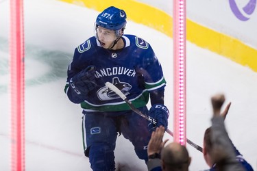 Vancouver Canucks' Nikolay Goldobin, of Russia, celebrates his goal against the Winnipeg Jets during the second period of an NHL hockey game in Vancouver, on Monday November 19, 2018. THE CANADIAN PRESS/Darryl Dyck