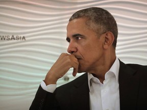 Former U.S. President Barack Obama listens to a question during a leadership summit in New Delhi, India, Friday, Dec. 1, 2017. (AP Photo/Manish Swarup)