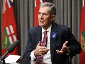 Manitoba Premier Brian Pallister speaks to media after the reading of the throne speech at the Manitoba Legislature in Winnipeg, Tuesday, Nov. 20, 2018.