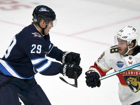 Patrik Laine of Winnipeg Jets and Mike Hoffman of Florida Panthers during the NHL Global Series Challenge ice hockey match  Friday, Nov. 2, 2018 in Helsinki, Finland.