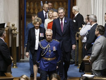 Manitoba premier Brian Pallister and Lieutenant Governor of Manitoba, Janice Filmon, enter the Manitoba Legislature before the provincial throne speech is read in Winnipeg, Tuesday, Nov. 20, 2018. THE CANADIAN PRESS/John Woods