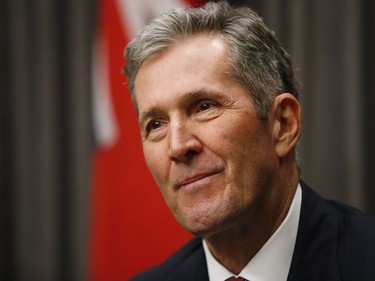 Manitoba Premier Brian Pallister speaks to media after the reading of the throne speech at the Manitoba Legislature in Winnipeg, Tuesday, Nov. 20, 2018. THE CANADIAN PRESS/John Woods