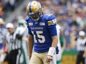 Blue Bombers quarterback Matt Nichols walks off the field after throwing an interception action against the Roughriders on Sept. 8. Nichols calls it the worst game of his career. (CP FILE)