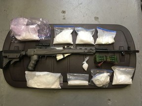 RCMP seized drugs, weapons and cash in a pair of recent raids.
RCMP handout