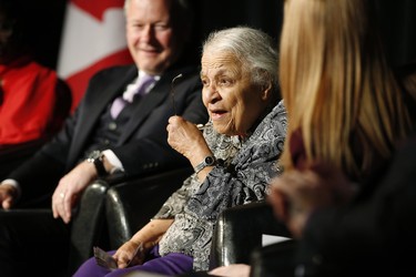 Clutching some $10 banknotes Wanda Robson, Viola Desmond's sister, speaks at a launch of Canada's new $10 banknote, which has a portrait of Desmond, the first Canadian woman on a banknote, at the Canadian Museum For Human Rights in Winnipeg, Monday, Nov. 19, 2018. Bank of Canada Governor Stephen Poloz and Robson, officially launched the unique, vertically oriented purple bill. THE CANADIAN PRESS/John Woods