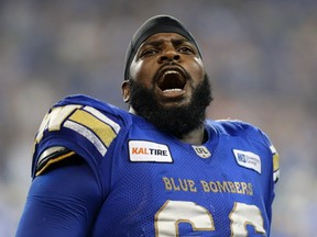 Winnipeg Blue Bombers OL Stanley Bryant fires up the crowd late in CFL action against the Hamilton Tiger-Cats in Winnipeg on Fri., Aug. 10, 2018. Kevin King/Winnipeg Sun/Postmedia Network