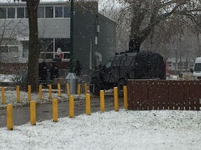 Police units including the Tactical Support Team's Armoured Rescue Vehicle are on the scene of an armed standoff on Friday, in the Gilbert Park housing complex in Shaughessy Park in the North End in Winnipeg. According to Winnipeg police spokesperson Const. Rob Carver, officers were called to the 100 block of Chudley Street at shortly after 4 a.m., to check on the well-being of a resident. The incident turned into an "armed and barricaded situation."