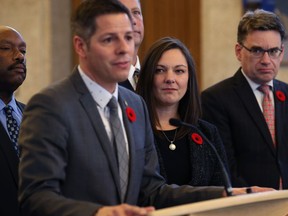 Coun. Sherri Rollins, the only rookie to be named to the executive policy committee, looks on with fellow councillor Markus Chambers (left) and Coun. Brian Mayes (right) as Mayor Brian Bowman speaks at City Hall in Winnipeg on Mon., Nov. 5, 2018. Kevin King/Winnipeg Sun/Postmedia Network