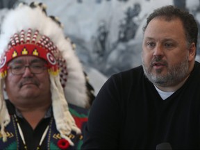 Jamie Kagan, lawyer, (right) and Chief Glenn Hudson, Peguis First Nation, during a news conference in Winnipeg. Friday.