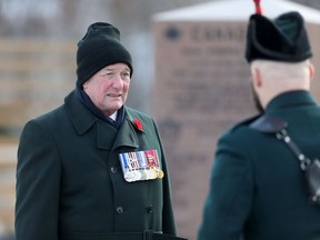 Major-General (retired) Dennis Tabbernor of the Royal Winnipeg Rifles Regimental Senate (left) at the unveiling ceremony of Legacy Stones to mark the regiment's 135th year on Saturday.