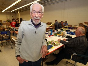 Kai Madsen, executive director of the Christmas Cheer Board, poses in the charitable organization's warehouse space on St. James Street.