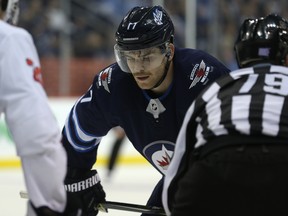 Winnipeg Jets centre Adam Lowry is facing a possible fine or suspension after delivering a high stick to the head of Nashville's Filip Forsberg in Friday's heated game in Winnipeg.