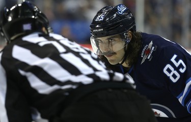 Winnipeg Jets forward Mathieu Perreault eyes the cameraa during a break in action against the Washington Capitals in Winnipeg on Wed., Nov. 14, 2018. Kevin King/Winnipeg Sun/Postmedia Network