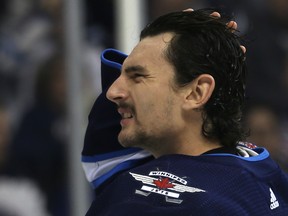 Winnipeg Jets goaltender Connor Hellebuyck gets ready to face the Washington Capitals in Winnipeg on Wed., Nov. 14, 2018. Kevin King/Winnipeg Sun/Postmedia Network