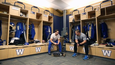 Adam Bighill (right) and Thomas Miles talk in the Winnipeg Blue Bombers locker room on Mon., Nov. 19, 2018. Kevin King/Winnipeg Sun/Postmedia Network