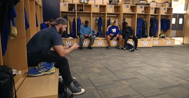 Matt Nichols (left) and other players sit in the Winnipeg Blue Bombers locker room on Mon., Nov. 19, 2018. Kevin King/Winnipeg Sun/Postmedia Network