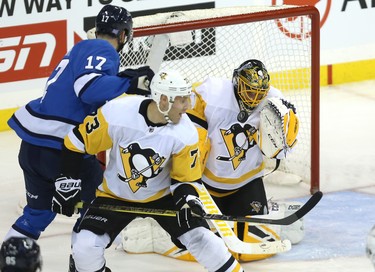 Pittsburgh Penguins goaltender Casey DeSmith makes a save against the Winnipeg Jets in Winnipeg on Tues., Nov. 27, 2018. Kevin King/Winnipeg Sun/Postmedia Network