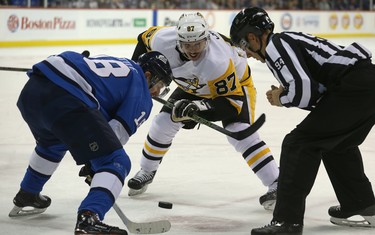 Winnipeg Jets centre Bryan Little (left) and Pittsburgh Penguins centre Sidney Crosby faceoff in Winnipeg on Tues., Nov. 27, 2018. Kevin King/Winnipeg Sun/Postmedia Network