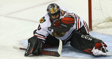 Chicago Blackhawks goaltender Corey Crawford makes a a glove save against the Winnipeg Jets in Winnipeg on Thurs., Nov. 29, 2018. Kevin King/Winnipeg Sun/Postmedia Network