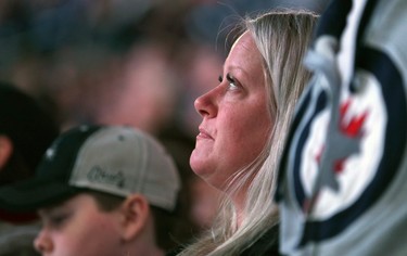 A fan tears up during the Hockey Fights Cancer presentation prior to the Winnipeg Jets facing the Chicago Blackhawks in Winnipeg on Thurs., Nov. 29, 2018. Kevin King/Winnipeg Sun/Postmedia Network