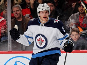 NEWARK, NEW JERSEY - DECEMBER 01:   Andrew Copp #9 of the Winnipeg Jets celebrates a goal in the third period against the New Jersey Devils at Prudential Center on December 01, 2018 in Newark, New Jersey. (Photo by Elsa/Getty Images)