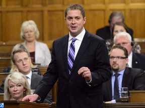 Conservative Leader Andrew Scheer stands in the House of Commons during question period on Parliament Hill in Ottawa on Wednesday, Oct. 3, 2018.