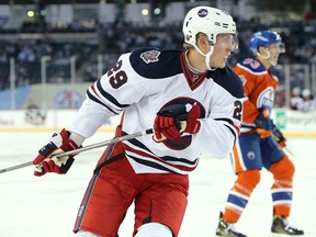 WINNIPEG, MANITOBA - OCTOBER 23: Patrik Laine #29 of the Winnipeg Jets skates against the Edmonton Oilers during the 2016 Tim Hortons NHL Heritage Classic hockey game on October 23, 2016 at Investors Group Field in Winnipeg, Manitoba, Canada. (Photo by Jason Halstead /Getty Images) ORG XMIT: POS2016102417013123