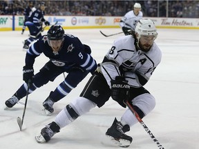 Los Angeles Kings defenceman Drew Doughty (right) leads the Kings in ice time (26:23) and has two goals and 18 points in 34 games.