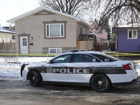 Winnipeg police investigate a killing in the 600 block of McGee Street last month. Omn Saturday, a suspect in the city's 21st homicide from 2018 was arrested with help of the cadet unit.