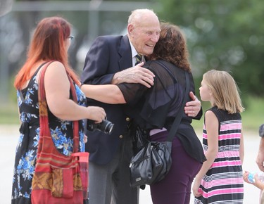 YR Year End.  98 year old Elmer Cole, an honoured Second World War veteran, is greeted by family members at 17 Wing in Winnipeg.  Cole participated in the Dieppe raid, he was then captured and became a prisoner of war for 13 months. 402 Squadron also participated in the operation.  Friday, August 17/2018 Winnipeg Sun/Chris Procaylo/stf