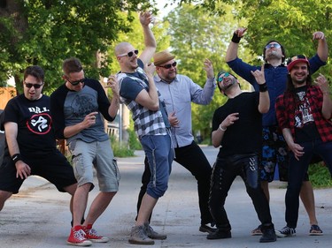 Mike Dedly, Damian Ray Nichols, Jeff Laird, Mr. Miles, Eric Nordquist, Mike Milner and Tristan Rivers shred a cacophony of air guitar solos on Wed., June 7, 2018. They will perform at the Windsor Hotel on Saturday, Bill and Ted Day, as the Wyld Stallyns, the band from the film series.  Kevin King/Winnipeg Sun/Postmedia Network