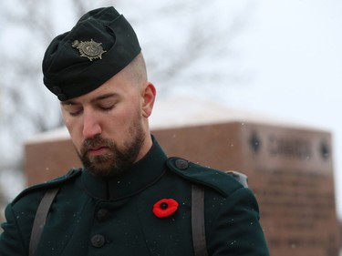A guard holds his post during the Royal Winnipeg Rifles Association Remembrance Day service at Vimy Memorial Park in Winnipeg on Sun., Nov. 11, 2018. Kevin King/Winnipeg Sun/Postmedia Network