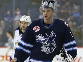 Eric Comrie stopped 31 shots in a losing cause as the Laval Rocket edged the Manitoba Moose 6-5 in a shootout on Saturday.