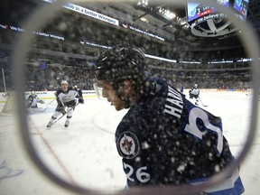 Jansen Harkins scored at 3:10 of overtime and Eric Comrie made 27 saves as the Manitoba Moose topped the Milwaukee Admirals 3-2 on Friday in American Hockey League action in Milwaukee.