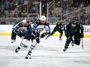 Winnipeg Jets defenceman Dustin Byfuglien (33) is hoping he can convince Paul Maurice he's ready to return from an ankle injury that's kept him out for 14 games.
