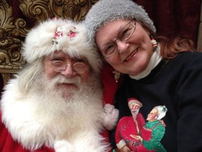 Brian Sanderson, as Santa Claus, and his partner Lillian Harris, as Mrs. Claus, are seen in this undated handout photo. Sanderson's iconic white beard and jolly demeanor landed him in Santa's bright red suit in Winnipeg malls, senior's centres, toy catalogues and as the mythical Christmas figure in quite a few Hallmark movies. So, when Sanderson, 77, Winnipeg's most well-known Santa helper, died in October a group of people, his own special elves, stepped up to make sure the Christmas magic he carried all year would continue.