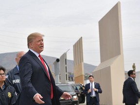 US President Donald Trump inspects border wall prototypes in San Diego, California on March 13, 2018.