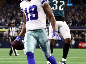 Cowboys wide receiver Amari Cooper runs for a touchdown past Philadelphia Eagles’ Rasul Douglas in overtime for a 29-23 win at AT&T Stadium in Arlington, Texas, yesterday. (GETTY)