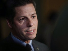 Winnipeg mayor Brian Bowman speaks to media after the reading of the throne speech at the Manitoba Legislature in Winnipeg on November 20, 2018.