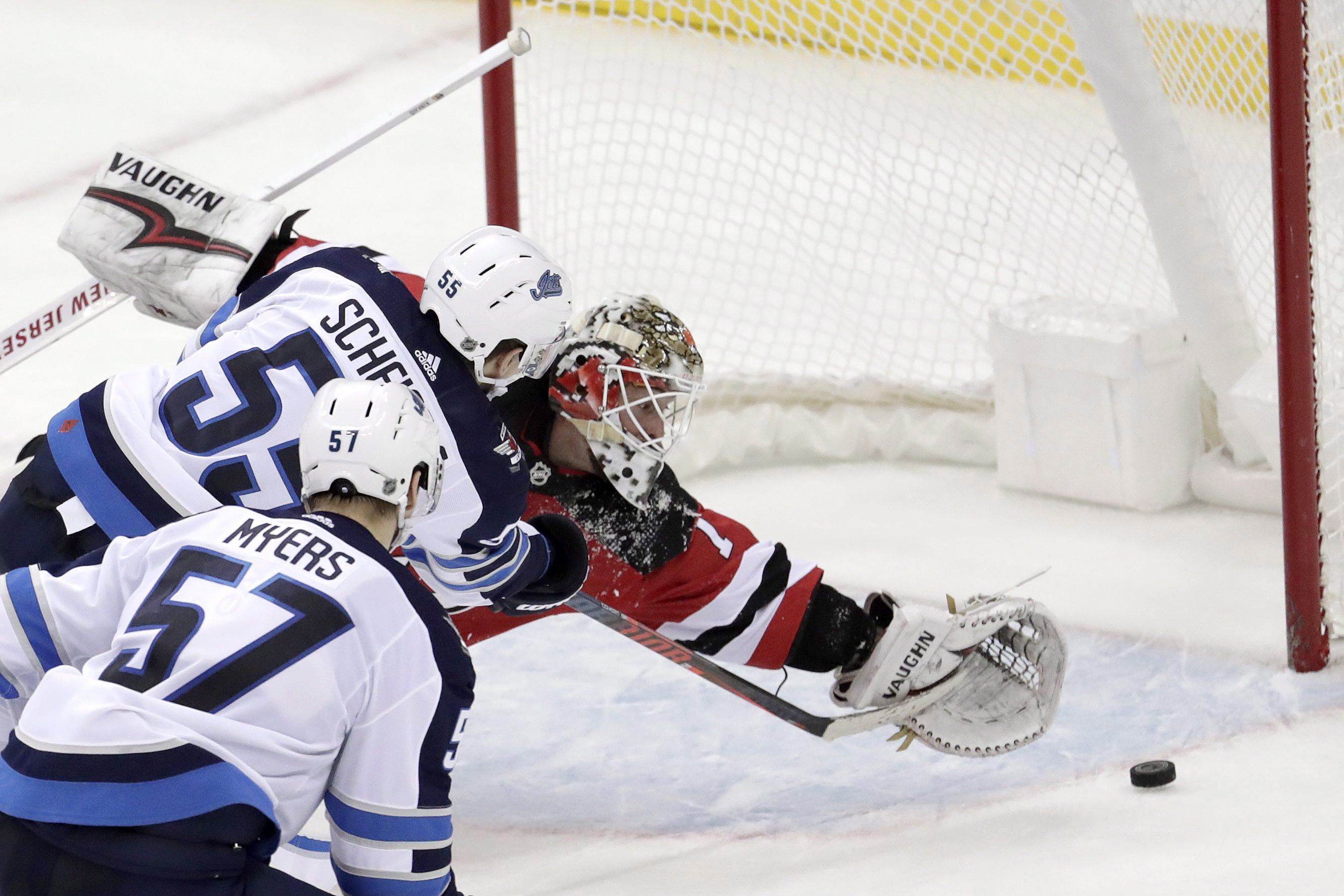 Scheifele's determination lifts Jets to overtime win after another third-period  lead slips away