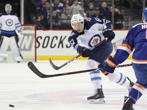 Jets' Nelson Nogier  takes a shot during Tuesday's game against the New York Islanders at the Barclays Center on Dec. 4, 2018 in Brooklyn. (GETTY IMAGES/PHOTO)