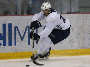 C.J. Suess turns with the puck during Winnipeg Jets development camp at Bell MTS Iceplex on Wednesday, June 27, 2018.