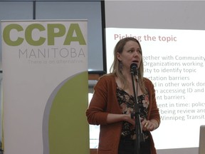 Author of the Canadian Centre for Policy Alternatives' State of the Inner City Report Ellen Smirl makes a presentation at Thunderbird House in Winnipeg on Friday.