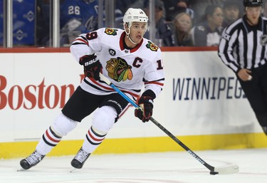 Chicago Blackhawks centre Jonathan Toews carries the puck against the Winnipeg Jets in Winnipeg on Tues., Dec. 11, 2018. Kevin King/Winnipeg Sun/Postmedia Network