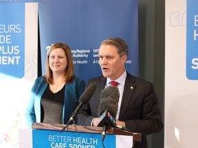 Health Minister Cameron Friesen (right) and MLA Sarah Guillemard (left) (Fort Richmond) addresses media at the opening of newly renovated mental health in-patient units at Victoria Hospital in Winnipeg. Victoria Hospital recently underwent $7 million in renovations, as the facility prepares to become one of three Centres of Excellence for Mental Health within the Winnipeg Regional Health Authority. The expanded mental health in-patient units at Victoria Hospital, which can now accommodate 75 clients, are part of a system upgrade and reorganization that will see the facility join Health Sciences Centre and St. Boniface Hospital as Winnipeg’s Centres of Excellence for Mental Health, offering the full spectrum of care to mental health clients. LUKE REMPEL/Winnipeg Sun/Postmedia Network