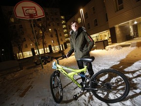 Emad Tamo, the Yazidi boy whose photo went viral after he was freed from ISIS and eventually reunited with his mother in Winnipeg, is photographed with his new bike outside his home at Immigrant and Refugee Community Organization of Manitoba (IRCOM) recently. Tamo's bicycle, his prize possession, was stolen in Winnipeg in the summer. When he received the offer to have it replaced, Tamo instead asked that all the Yazidi refugee children he knows get bicycles. With the help of a donation from an American man, 100 bicycles were purchased for the refugee children and they will receive them on Yazidi Eid.