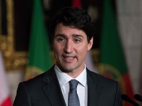 In this file photo taken on May 3, 2018 Canadian Prime Minister Justin Trudeau speaks during a joint media availability with Portuguese Prime Minister António Costa(not pictured) on Parliament Hill in Ottawa, Ontario.