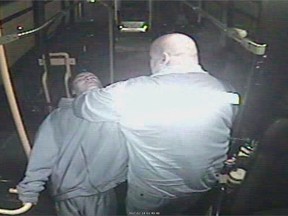 Bus driver Irvine Fraser (right) and passenger Brian Thomas are shown in Winnipeg in this 2017 still image from security video submitted into court as evidence. Crown prosecutors have argued security camera footage shown in a Winnipeg courtroom depicts the moments bus driver Fraser confronted a passenger on Feb. 14, 2017 before he was killed. Thomas is on trial for second-degree murder in the death.